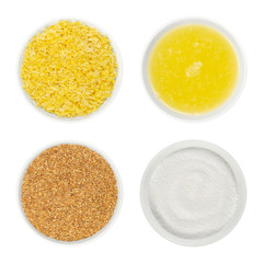 Lemon zest, juice and citric acid in white glass bowls. Fresh and dried grated lemon peel, freshly...