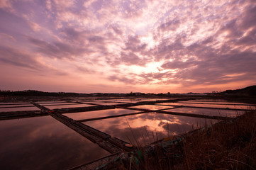 Sunset on the salt evaporation pond.