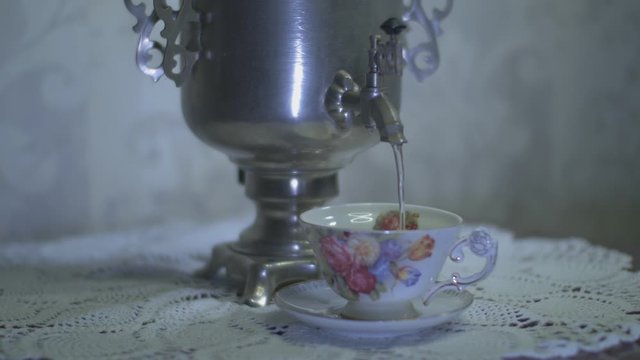 Pouring Hot Water from a Vintage Electric Metal Tea Kettle into a Gorgeous Cup.
