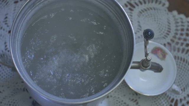 Water Boils in a Vintage Electric Metal Kettle.