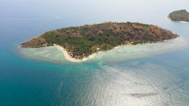 Aerial drone of group of tropical islands with beaches on the Zamboanga Peninsula. Bobo Island, Baong Island. Mindanao, Philippines.