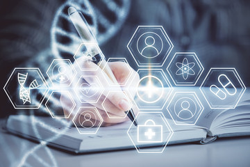 DNA theme hologram over woman's hands writing background. Concept of education. Double exposure