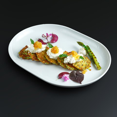 Dishes of traditional Russian cuisine. Restaurant serving. Black background.