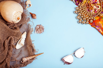 diverse travel girlish stuff on colorful background blue and yellow, nobody tourism lifestyle concept