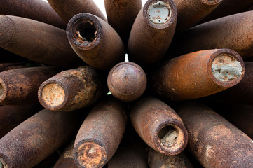 Sad war artifacts,pile of old unexploded bombs.