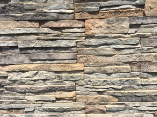 Stone texture  irregularly grey granite stone wall texture and background. 