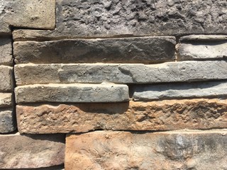 Stone texture  irregularly grey granite stone wall texture and background. 