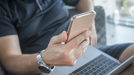 Man working from home, detail, pale colors