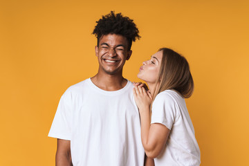 Portrait of man kissing woman on mens cheek