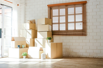 Many large brown paper boxes Was placed at the entrance of the house. Relocation concepts. copy space