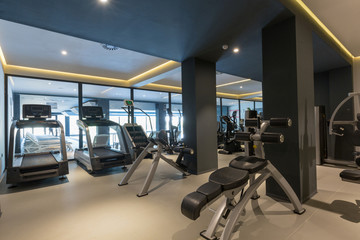 Fototapeta na wymiar Interior of a hotel gym with equipment