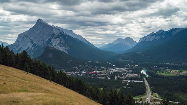 Banff National Park, Alberta, Canada, daytime time lapse view of Banff village and Mount Rundle during summer.