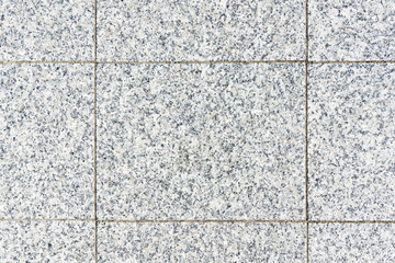 Mineral grain texture. Distressed noise pattern. Marble background. Flat granite surface. Macro effect structure for graphic design. Pavement blocks top view.