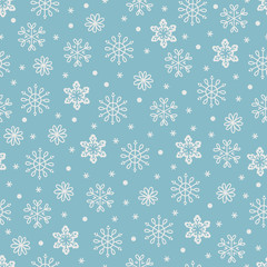 Christmas seamless pattern with white snowflakes. Perfect for winter holidays