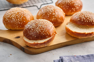 Fresh homemade burger buns with sesame. Copy space.