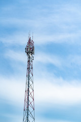 Telecommunication tower of 4G and 5G cellular. Macro Base Station. Wireless Communication Antenna Transmitter. Telecommunication steel high tower with antennas against blue sky.