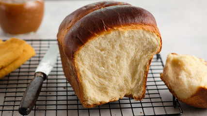 Japanese brioche, Japanese milk bread. Homemade baking. Fresh homemade crisp bread. Copy space, selective focus