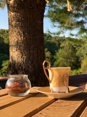Naklejka na ściany i meble cup of tea on wooden table