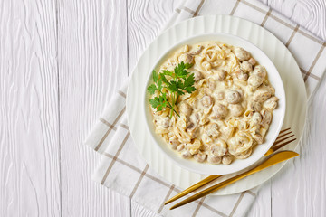 champignons sauteed in garlic sour cream sauce