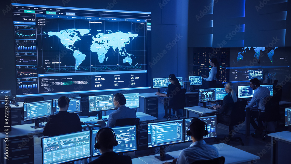 Aufkleber Team of Professional Computer Data Science Engineers Work on Desktops with Screens Showing Charts, Graphs, Infographics, Technical Neural Data and Statistics. Dark Control and Monitoring Room.