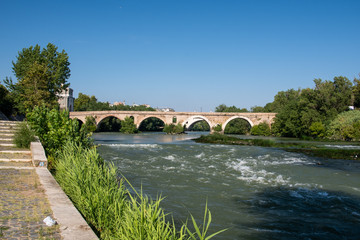 Fototapeta na wymiar Milvian Bridge on river Tiber in Rome, Italy