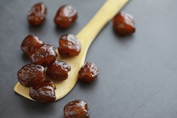 Healthy foods. Dried fruits for diet. Prunes, dates, raisins and figs. Healthy and proper nutrition for life.