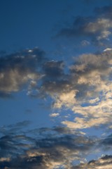 Naklejka na ściany i meble grey and white clouds on blue sky