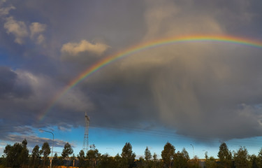 Colourful rainbow over Country side in Sydney NSW Australia