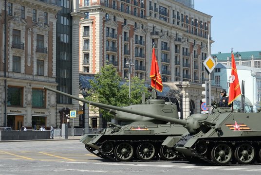 T-34-85 medium tank and SU-100 self-propelled artillery unit on Tverskaya street during the dress rehearsal of the parade dedicated to the 75th anniversary of the Victory