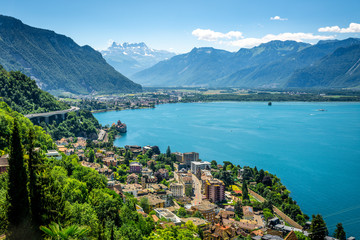Aerial view of Geneva lake with Swiss Alps panorama from Montreux to Villeneuve and Chillon castle in Veytaux city Switzerland - obrazy, fototapety, plakaty