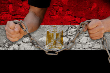 male hands break the iron chain, a symbol of bondage,protest against the background of the national...