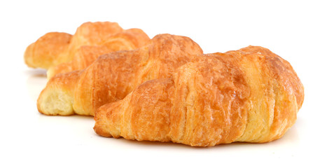 Fresh and tasty croissant over white background