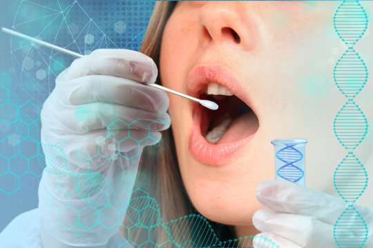 female doctor, laboratory assistant, takes a saliva sample for analysis of DNA from a woman's mouth, the concept of innovation in modern science, test for parenting, relationship, disease