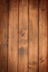 Fototapeta premium Wood table top view. Timber plank surface wall for vintage grunge wallpaper. Old floor wooden pattern. Dark grain panel board table with copy space. Montage product design concept.