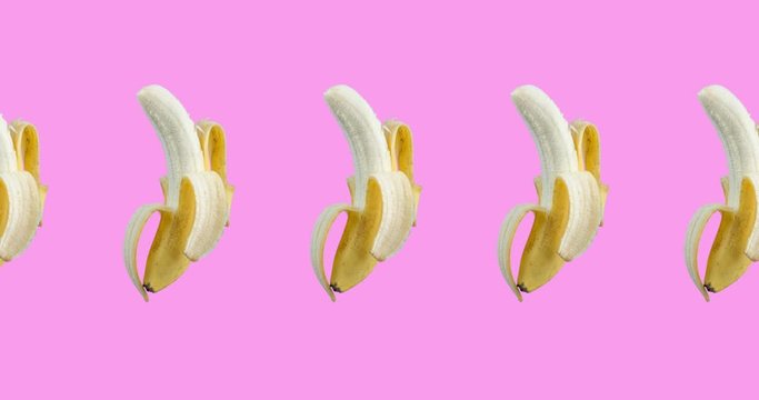 many bananas animated on a pink background. seamless looping of realistic 3d tropical food. minimal motion design art
