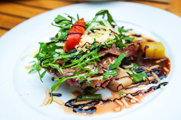 juicy steak beef meat with tomato and potatoes