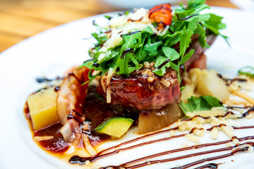 juicy steak beef meat with tomato and potatoes