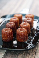 Canele is a small French pastry with rum and vanilla