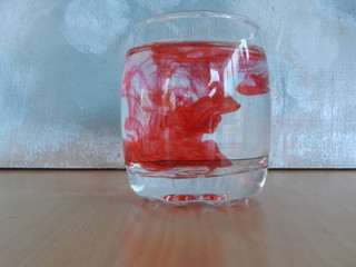 glass of water with red color