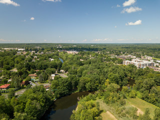 View of a little town, lake and river from the sky. Cowansville, Quebec, Canada