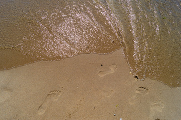 feet on the beach