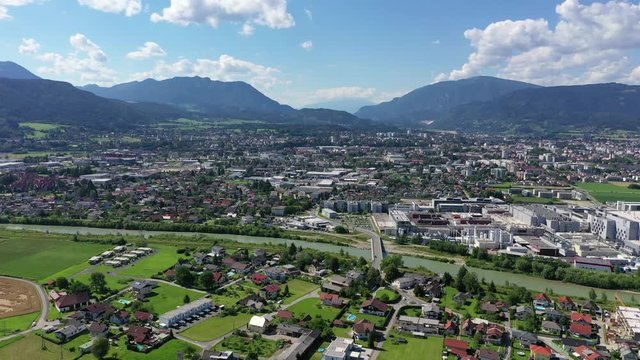 Villach and Drau river in Carinthia. Aerial panoramic view to the small famous town in the South of Austria during summer.