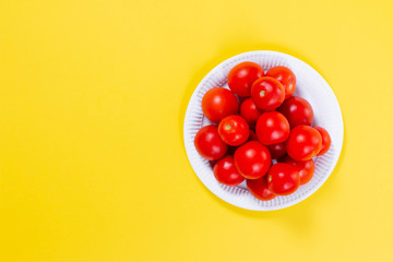 Fresh tomatoes on a color background. Flat lay, top view. Copy