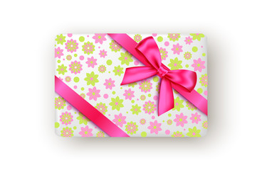 Pink and green gift box with ribbon and bow.