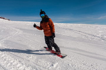 Fototapeta na wymiar snowboarder on the slope