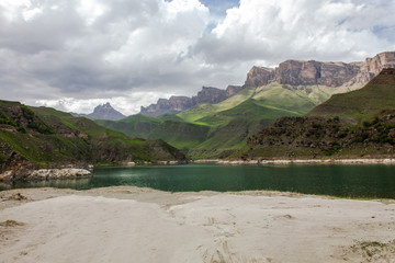 amazing deep mountain lake among rocks and peaks