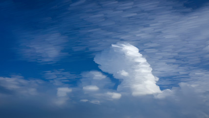 Abstract cloud movement compiled and stacked from multiple cloud images.