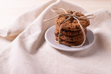 homemade oatmeal cookies on rustic background