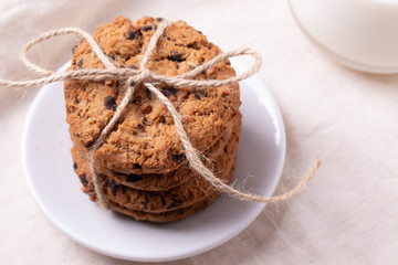 homemade oatmeal cookies on rustic background