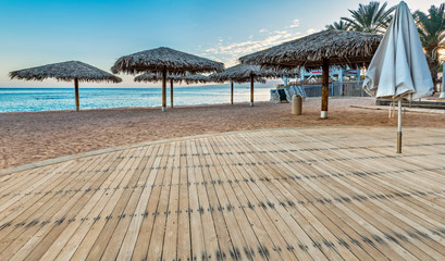 Umbrellas or sunshades on the beach at the Red Sea, Middle East